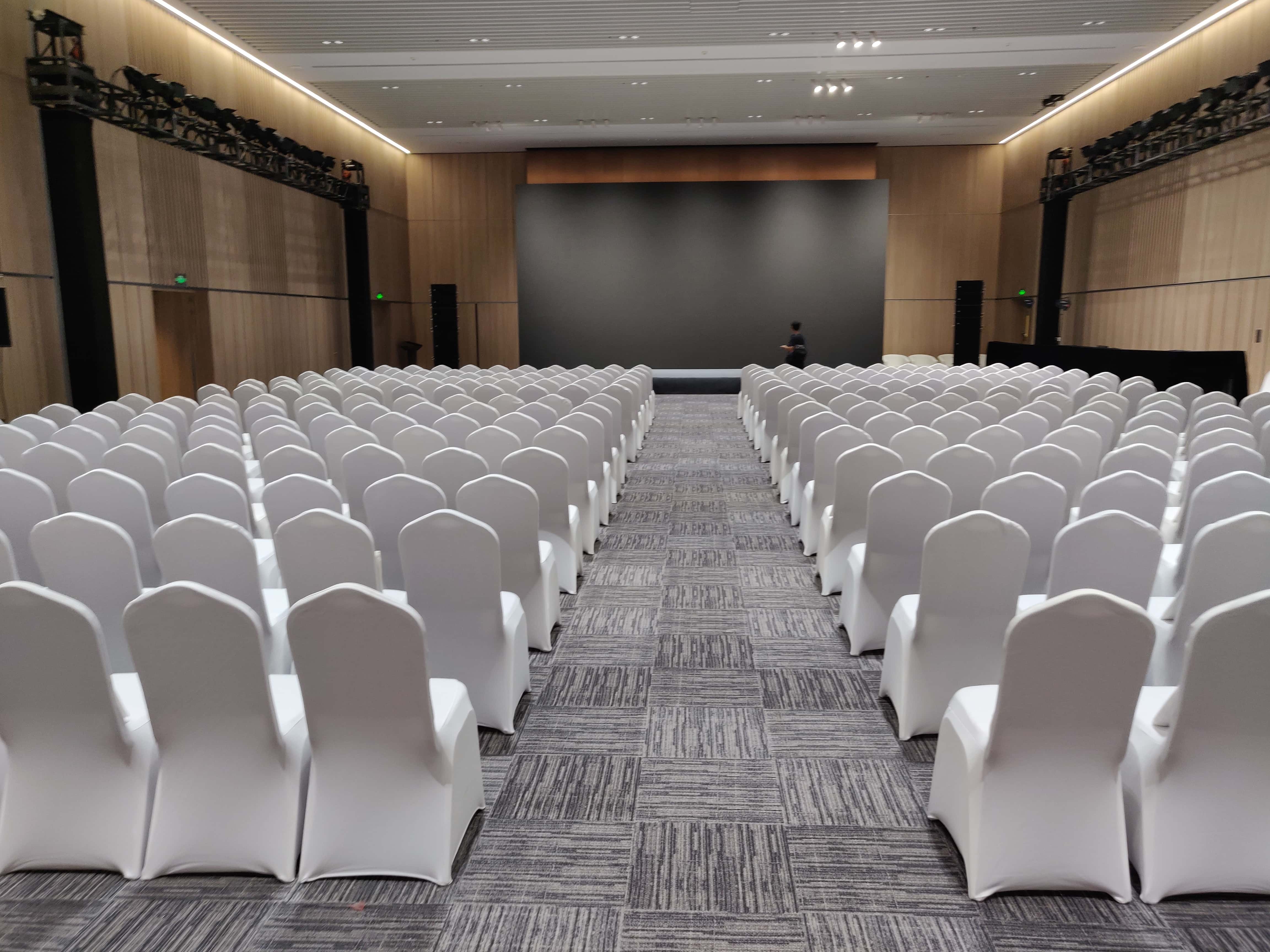 404Rent Shanghai conference chair rental — large conference hall with white-covers banquet chairs in neat rows